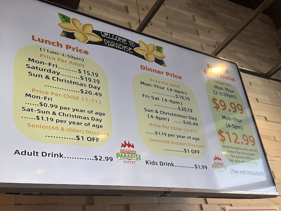 Menu board showing lunch and dinner pricing.
